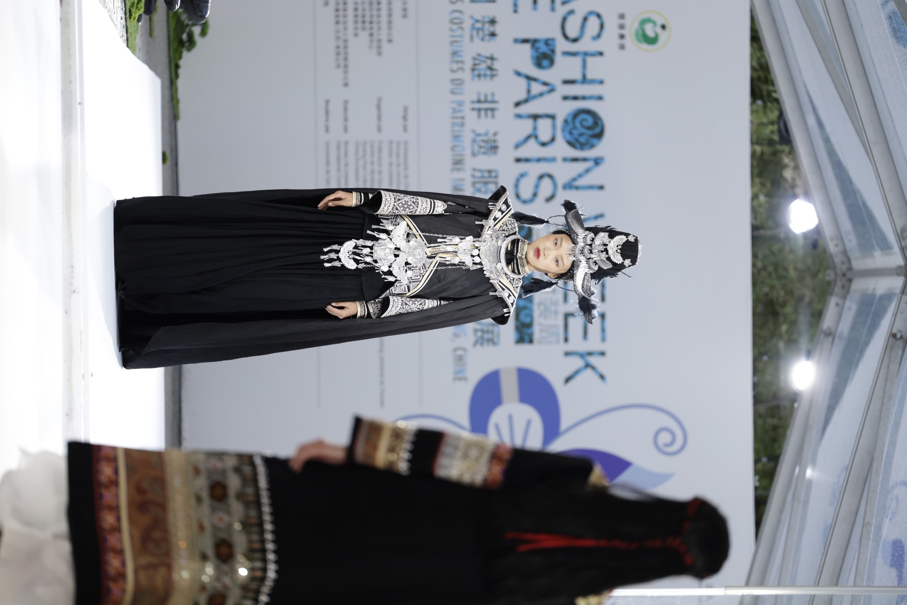 Chuxiong Yi silver headdress and black runway look