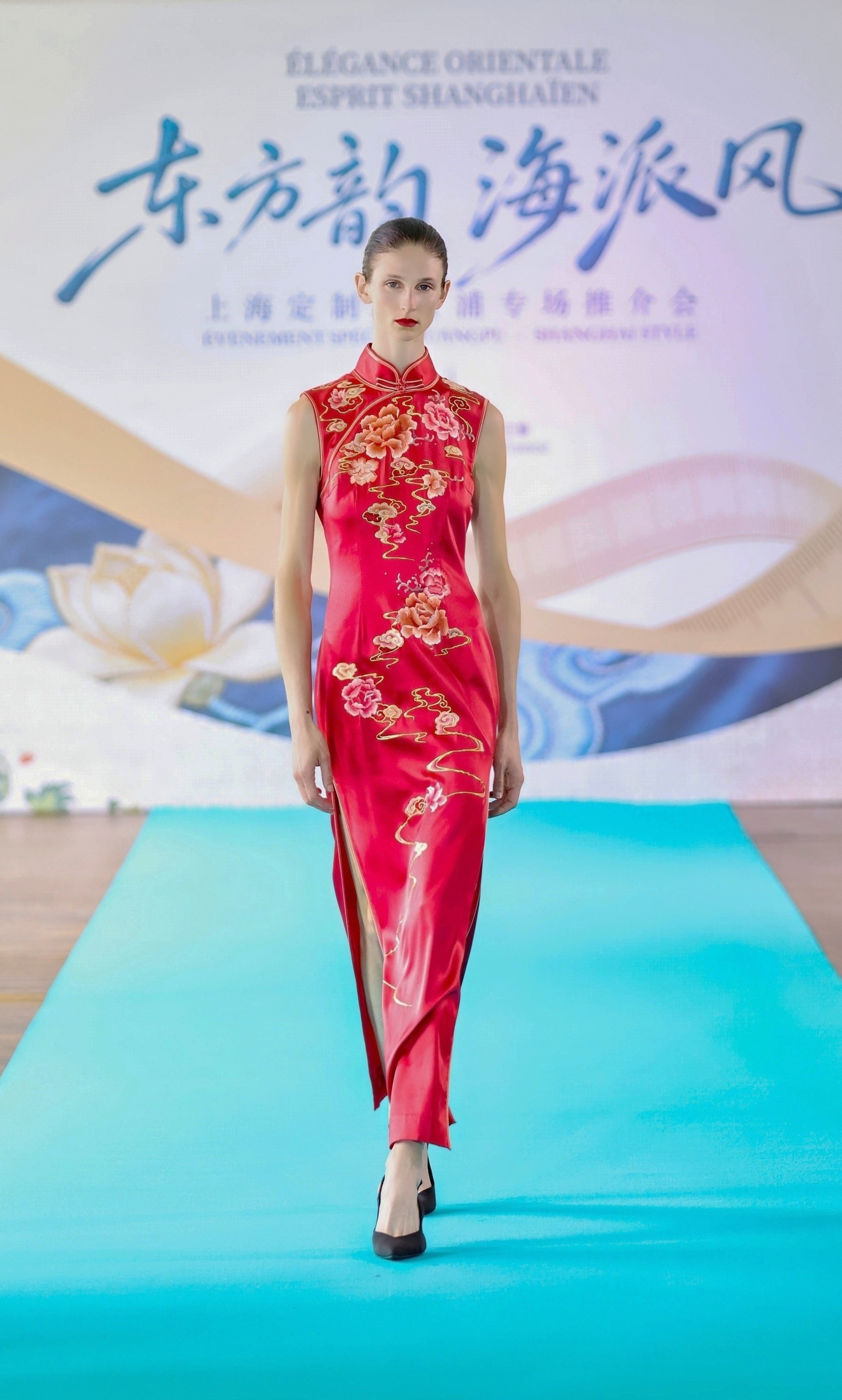 Xiu Niang red floral runway look